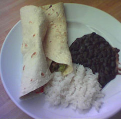 fajitas, rice and beans on a plate