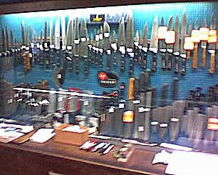 easily 50 knives behind the counter