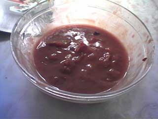 a brown thick liquid in a glass bowl